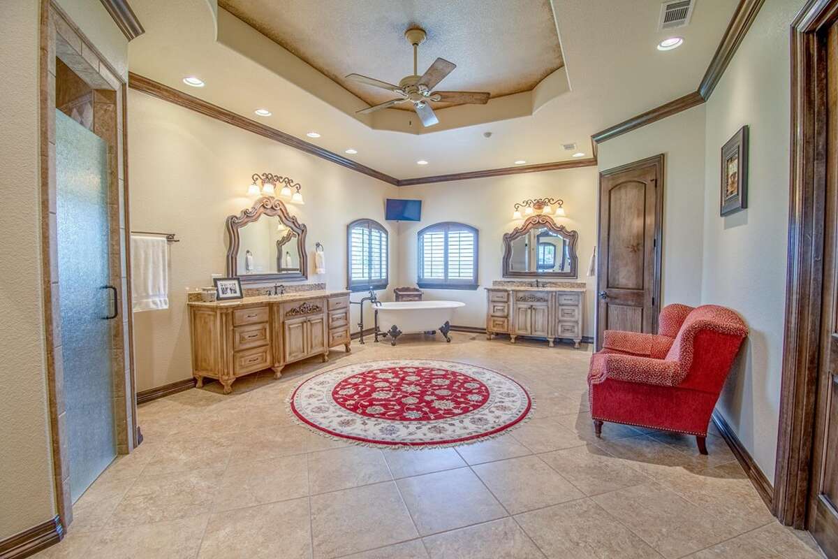 2.395 million Gardendale home features Texasshaped pool