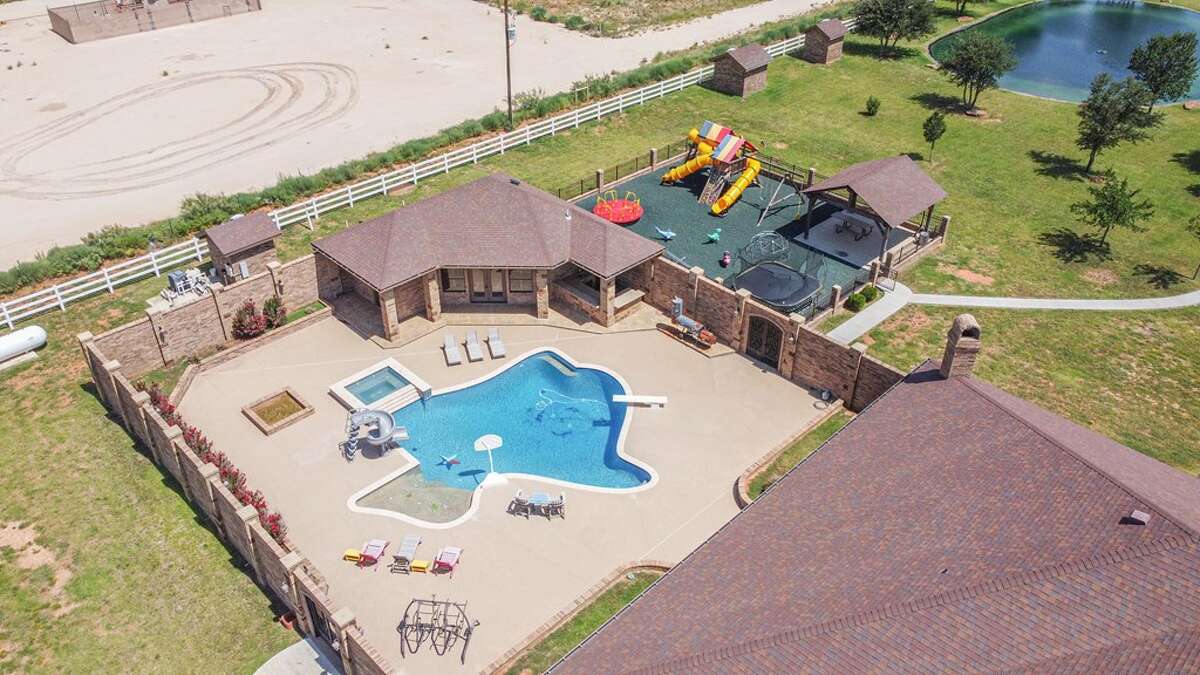 2.395 million Gardendale home features Texasshaped pool