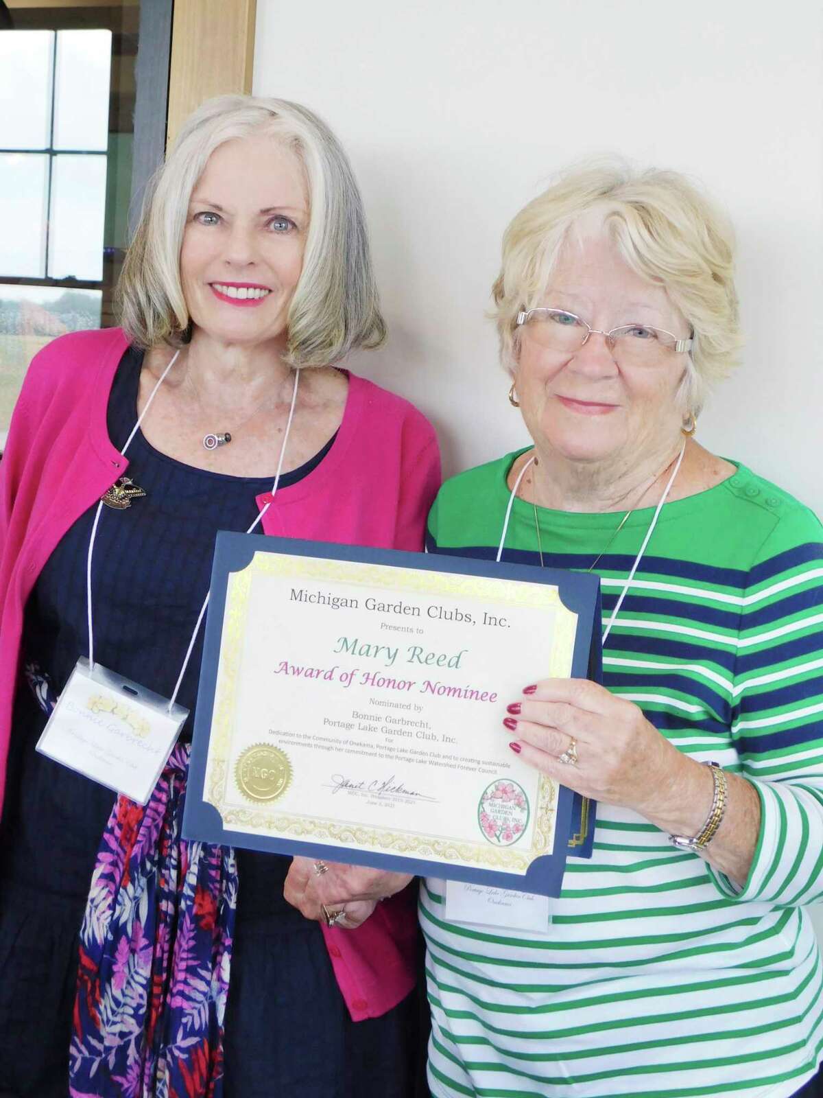 Mary Reed, of Onekama, has been nominated for the Michigan Garden Club Award of Honor. She is pictured with Portage Lake Garden Club President Bonnie Garbrecht. (Courtesy photo/Chris Gravlin)