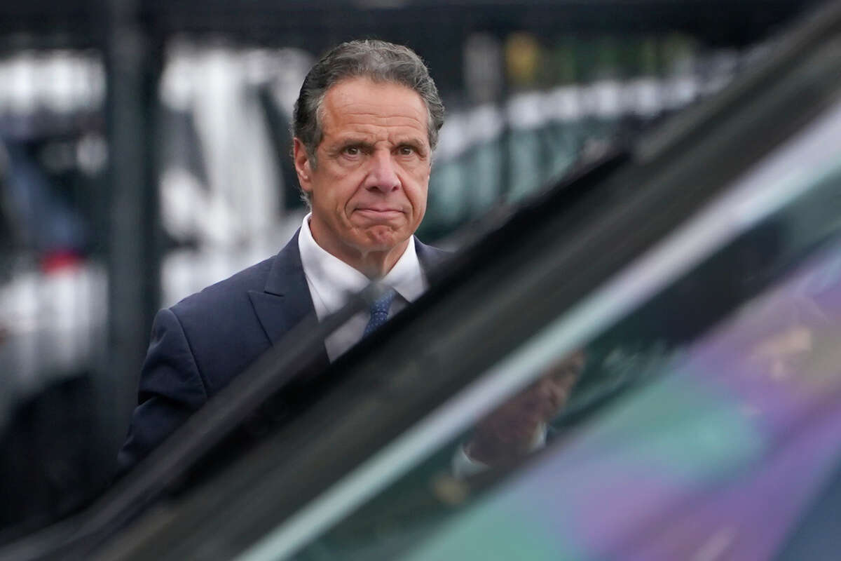 Former New York Gov. Andrew Cuomo prepares to board a helicopter after announcing his resignation, Tuesday, Aug. 10, 2021, in New York.