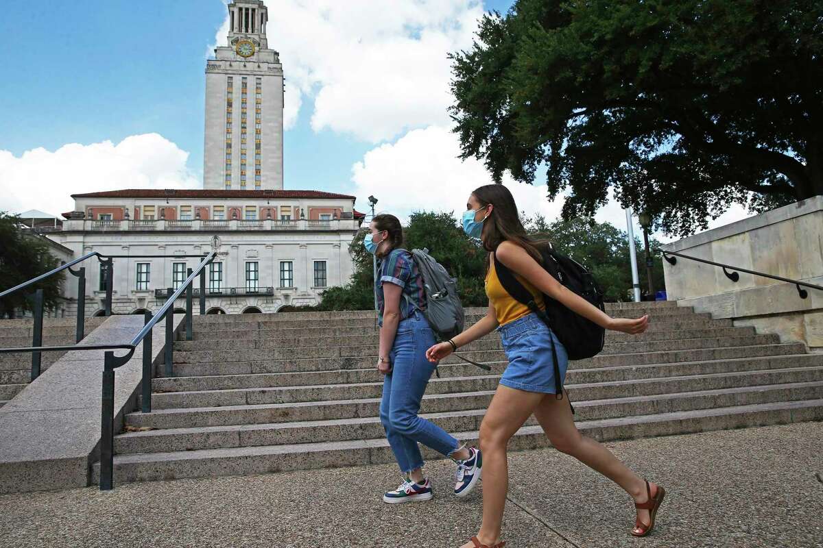 University of Texas students walk on campus to and from classes on Sept. 14, 2020.
