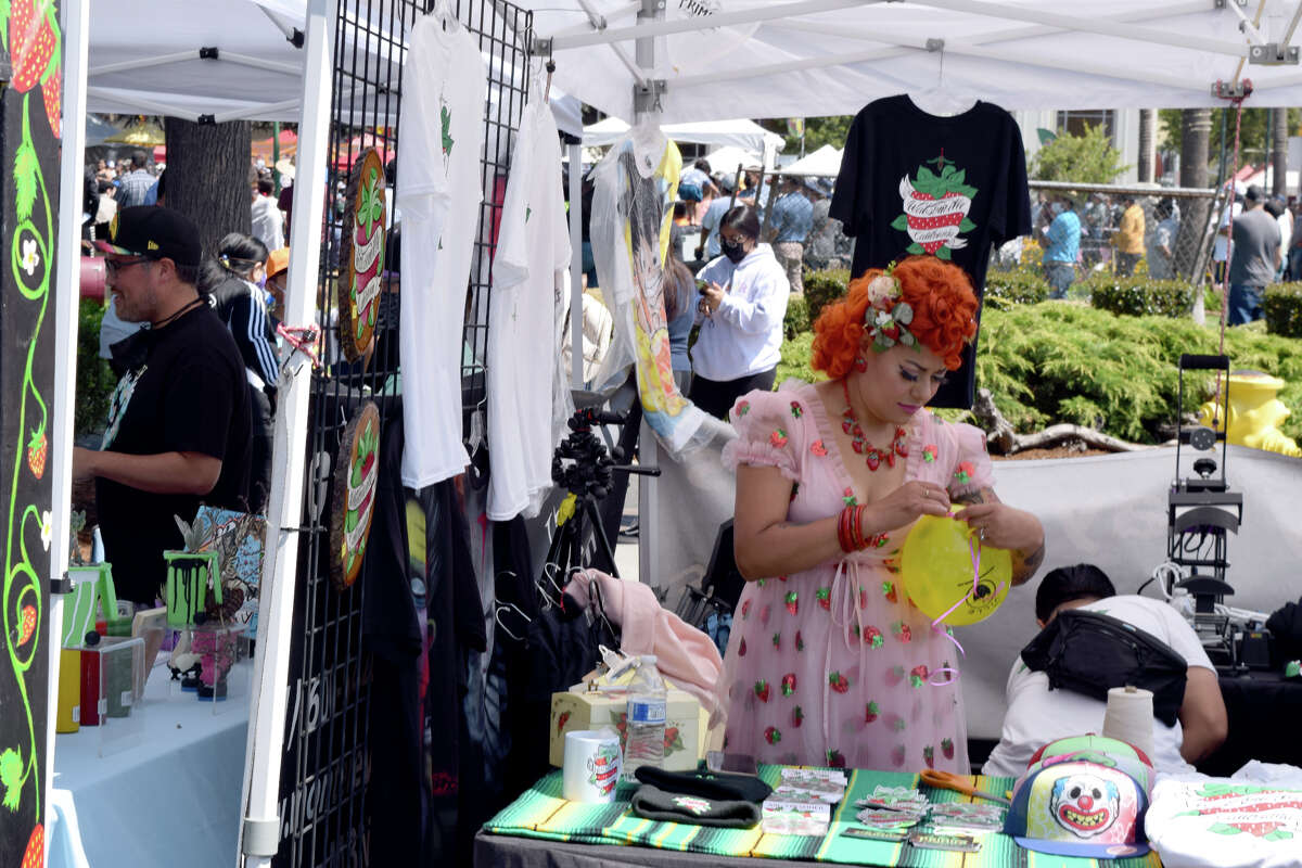A vendor at this year's Watsonville Strawberry Festival on Aug. 8, 2021.