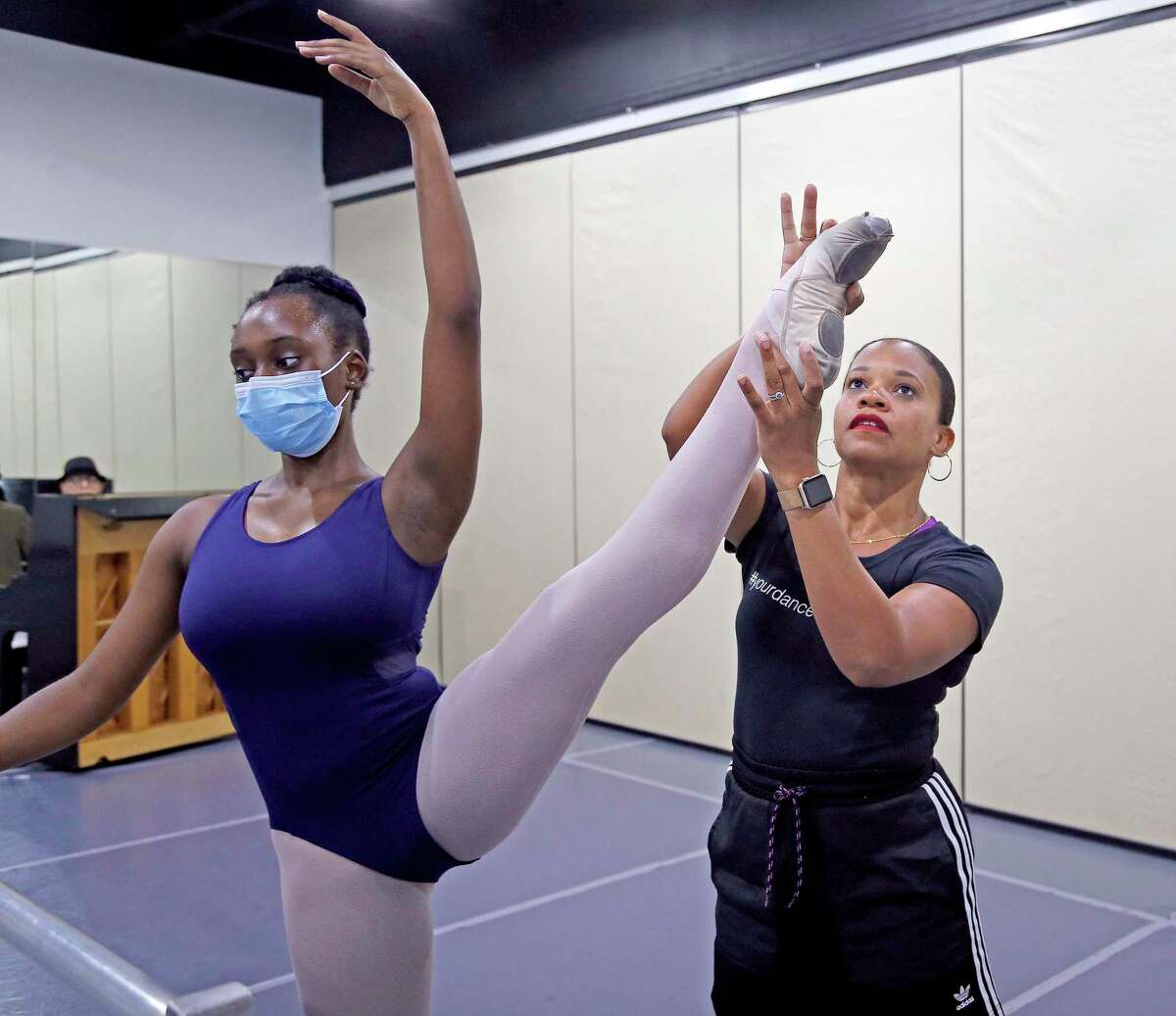 Danielle Campbell Steans, who started the San Antonio Ballet School in Castle Hills instructs Keilah Owens on Wednesday, July 28, 2021.