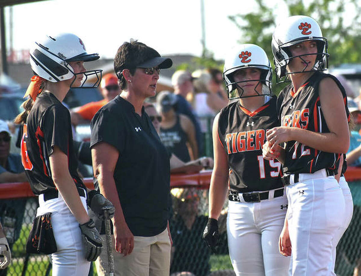 Edwardsville coach Lori Blade (second left) talks with some of her Tigers during a game last season. Blade is the 2021 Telegraph Large-Schools Softball Coach of the Year.