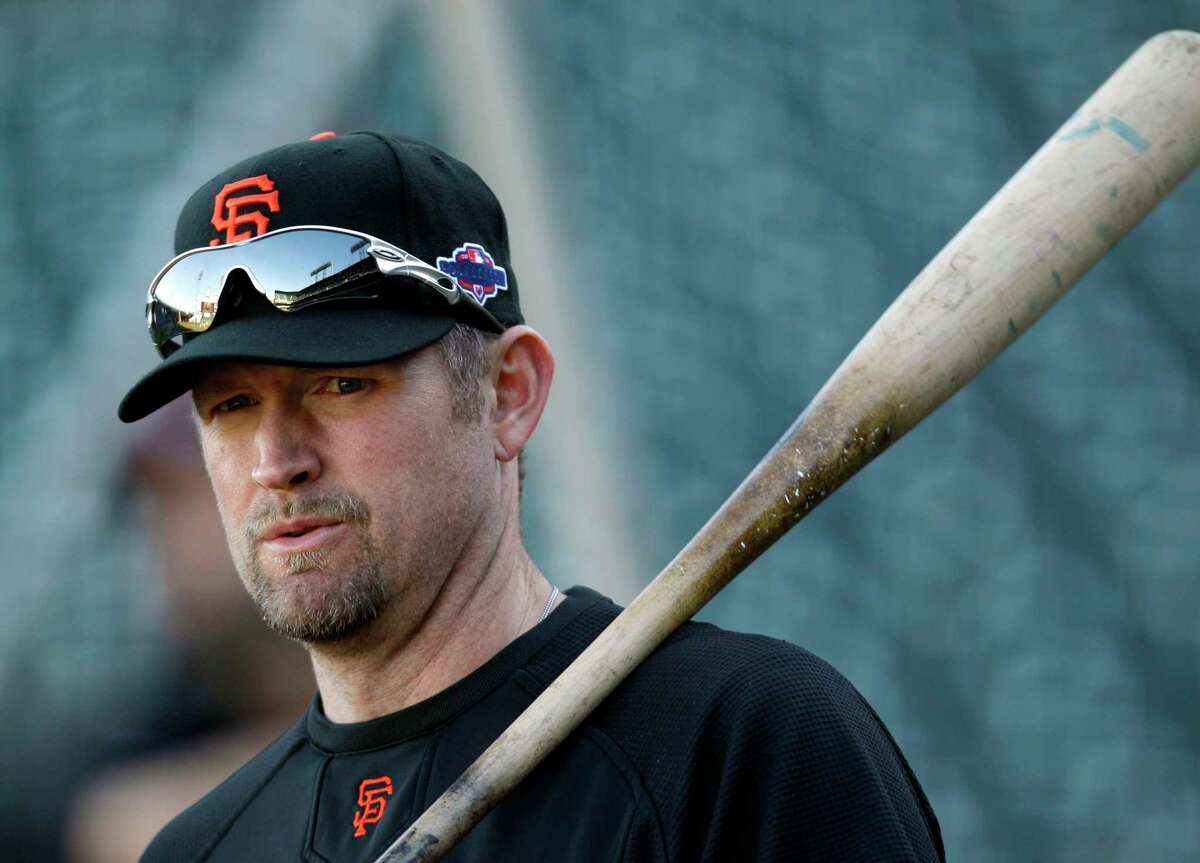 San Francisco Giants first baseman Aubrey Huff warms up before Game 2 of the National League division baseball series against the Cincinnati Reds in San Francisco, Sunday, Oct. 7, 2012. (AP Photo/Eric Risberg)