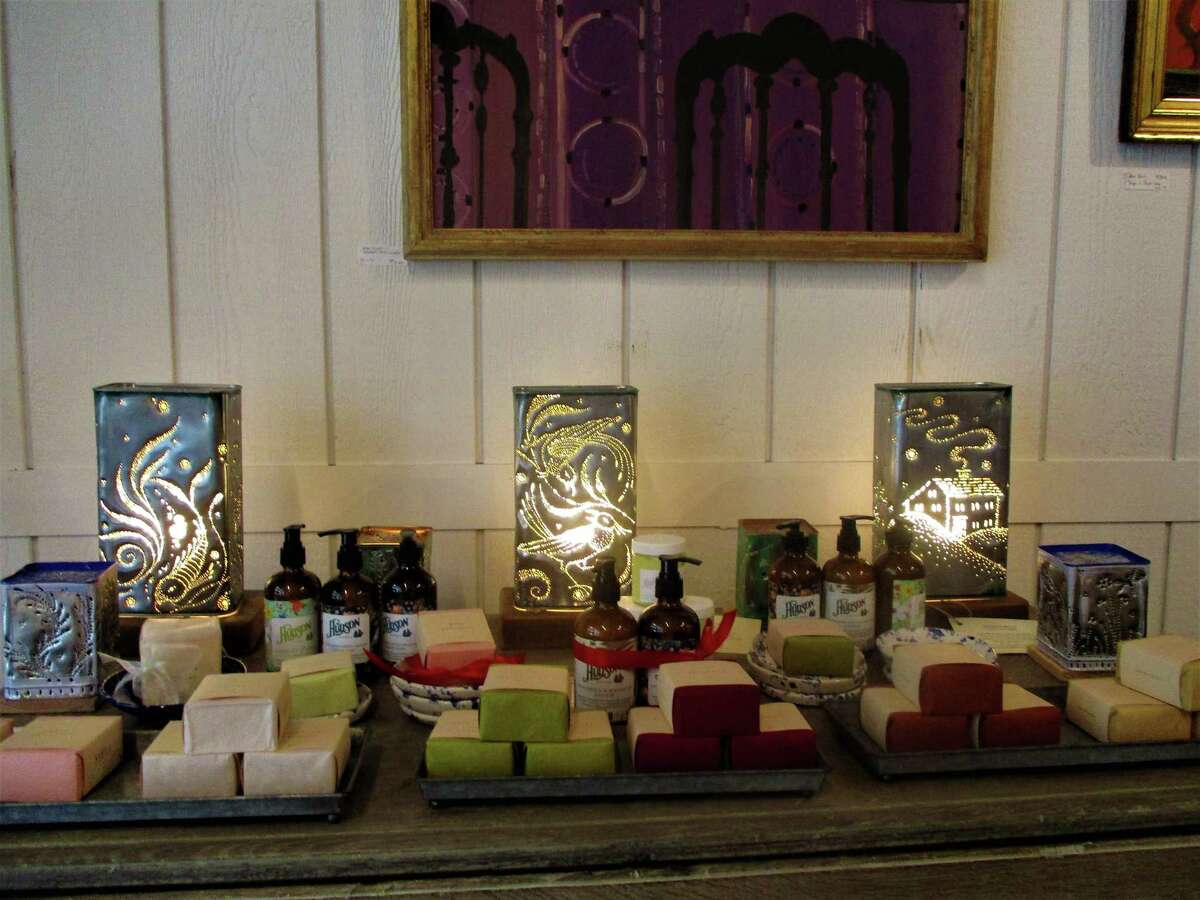 Elizabeth Wolff's pierced tin lanterns amongst homemade soaps.