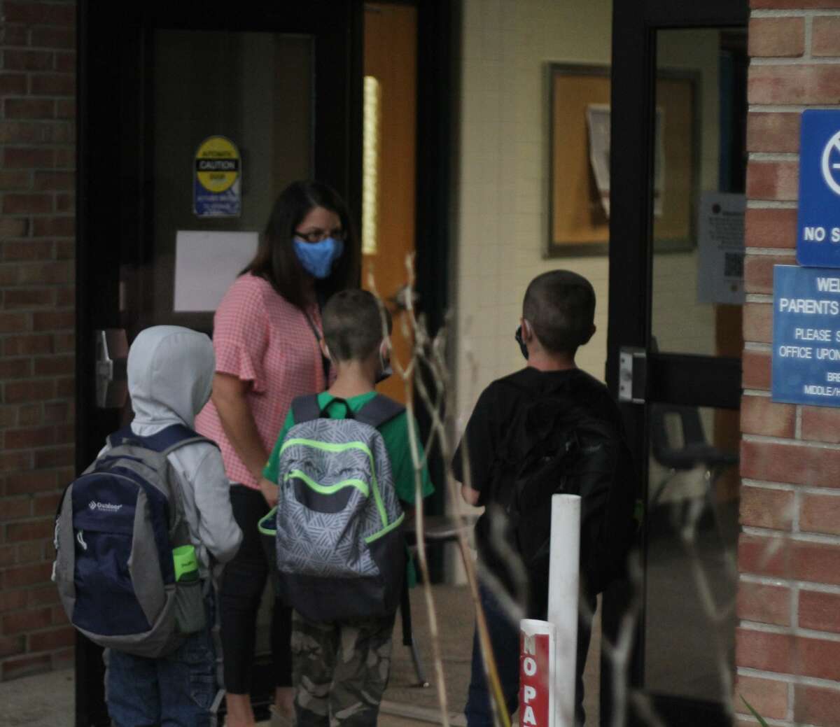 In this file photo, Kaleva Norman Dickson Schools students enter the building on the first day of school, Sept. 8, 2020.