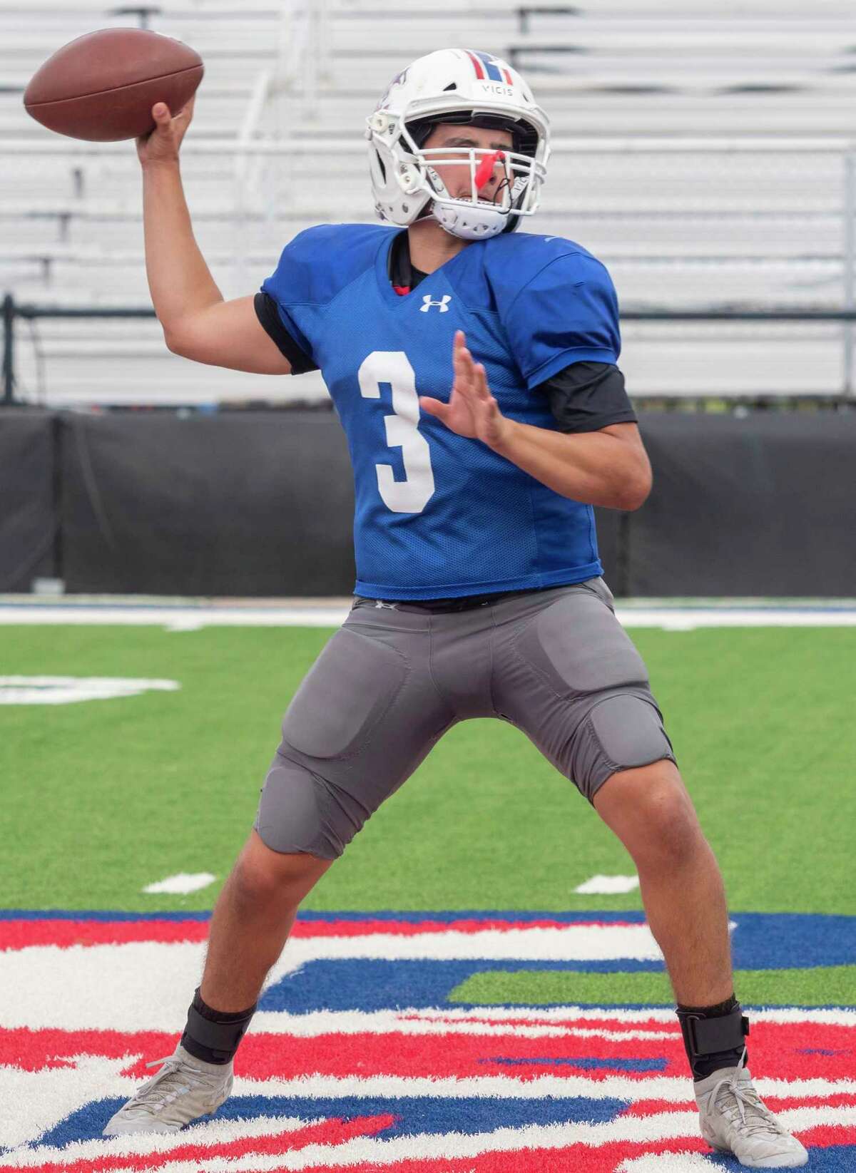Midland Christian's Ryver Rodriguez looks to pass as he and other players run drills 08/11/2021at Gordon Awtry Field. Tim Fischer/Reporter-Telegram