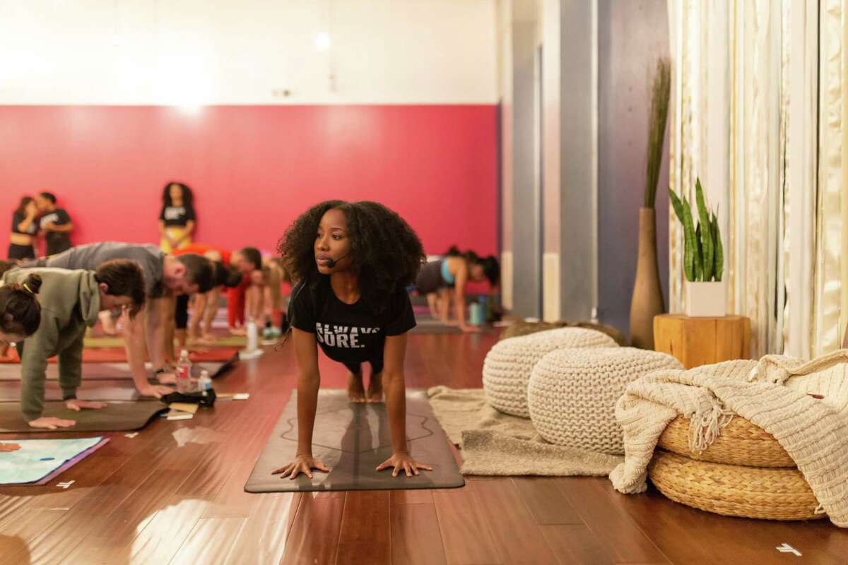 Yoga instructor, healer, and entrepreneur Jazmin Porter leads an initiative that teaches yoga and mindfulness to Houston Police officers. Photo from previous course not with HPD.