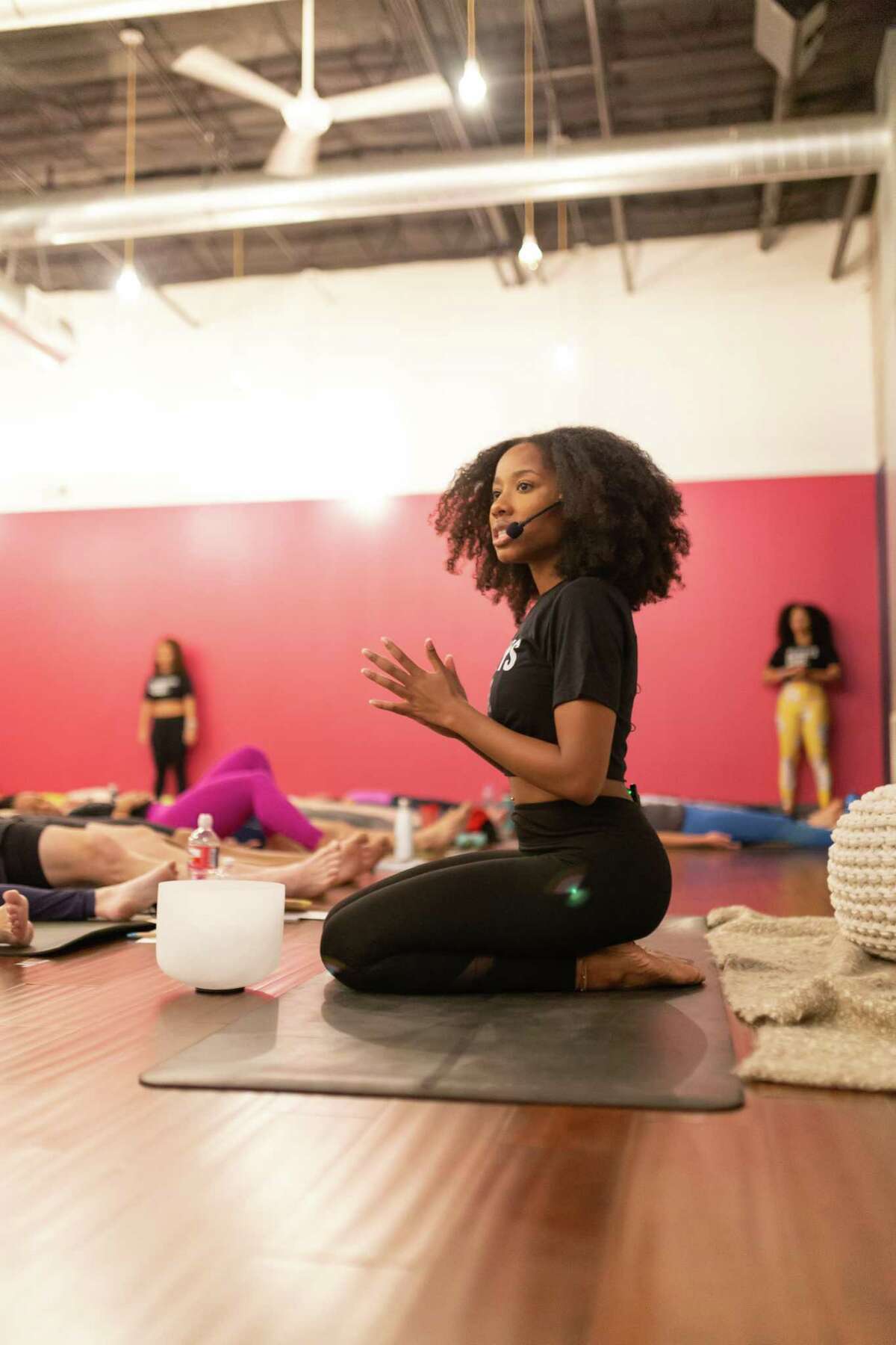 Yoga instructor, healer, and entrepreneur Jazmin Porter leads an initiative that teaches yoga and mindfulness to Houston Police officers. Photo from previous course not with HPD.