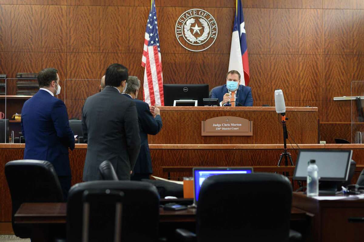 Gene Wu appears with his lawyers at the Harris County Courthouse on Wednesday, Aug. 11, 2021. State District Judge Chris Morton granted a writ of habeas corpus for State Rep. Gene Wu, pre-empting a civil arrest warrant for his absence in the Texas Legislature.