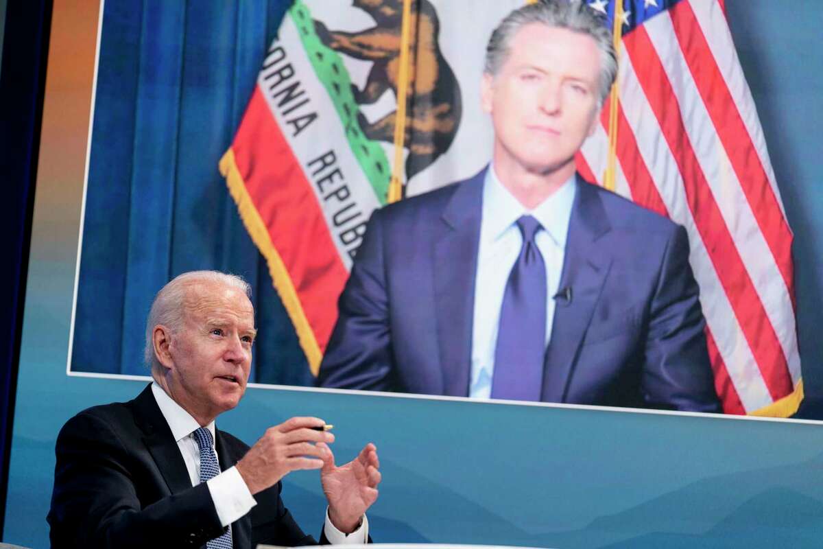 President Biden speaks with California Gov. Gavin Newsom via teleconference during a meeting with governors to discuss efforts to strengthen wildfire prevention, preparedness and response in July.