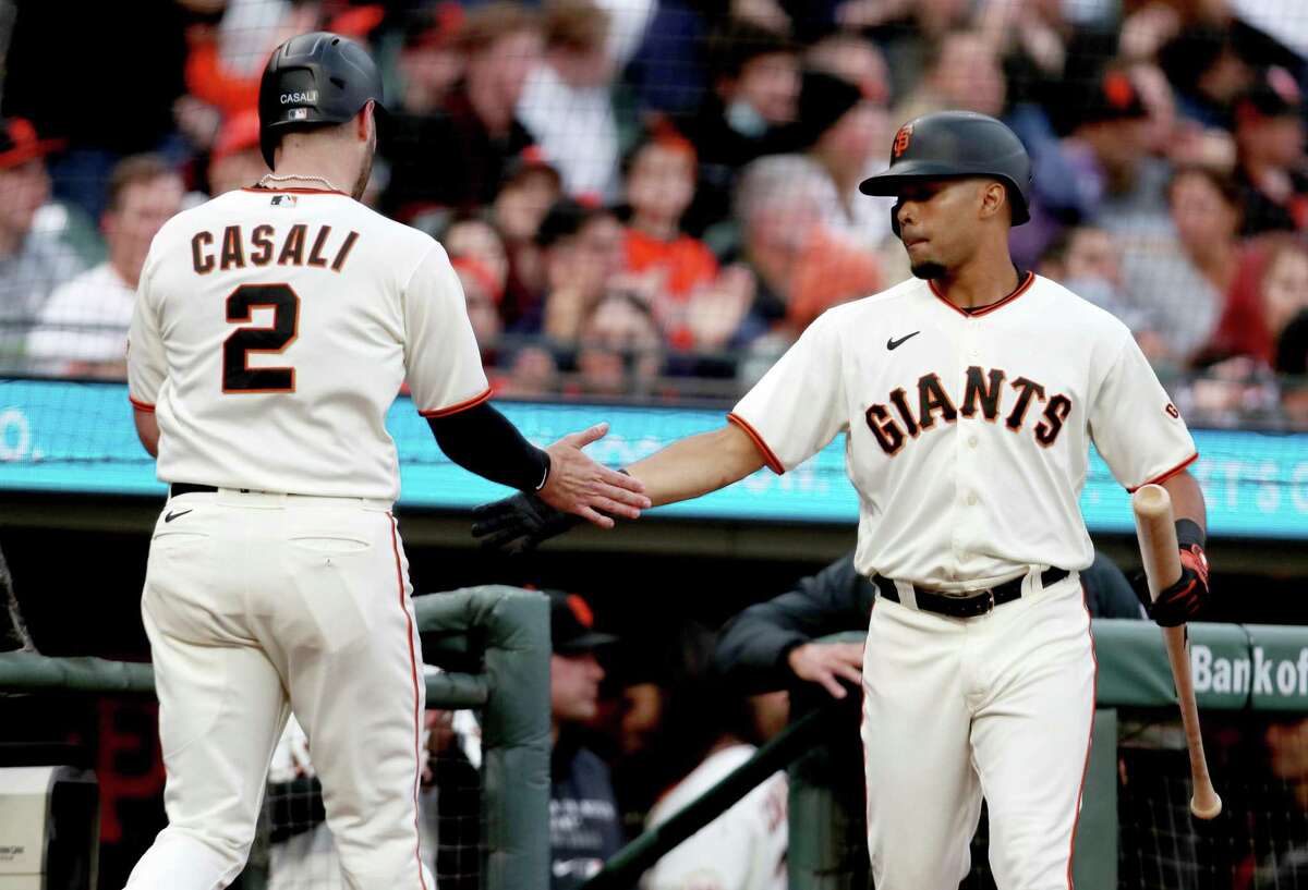 Brandon Crawford and LaMonte Wade Jr. #31 of the San Francisco Giants  News Photo - Getty Images