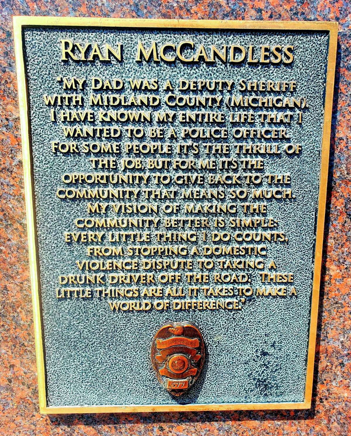 A closeup of the memorial for James Ryan McCandless, who was killed in the line of duty on Aug. 2, 2011.