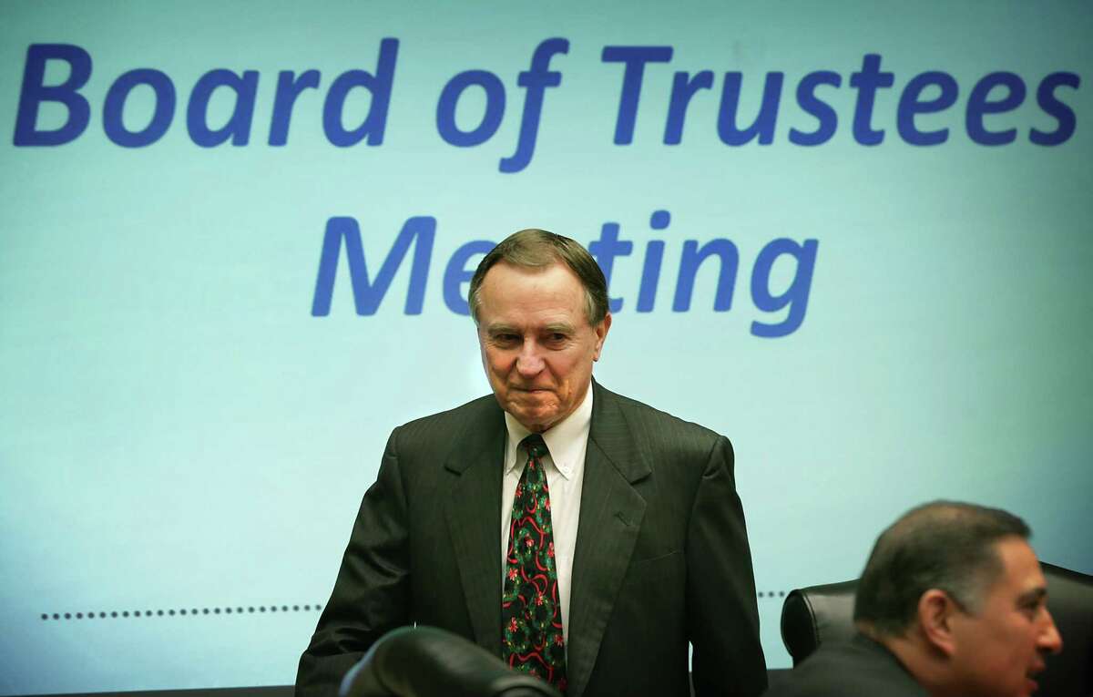 CPS Energy Trustee Ed Kelley prepares to lead a board meeting at the company's headquarter on Monday, Dec. 14, 2015.