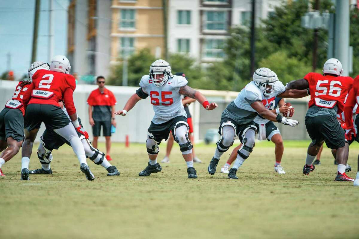 Way cool! UH quarterback Clayton Tune hangs with, learns from