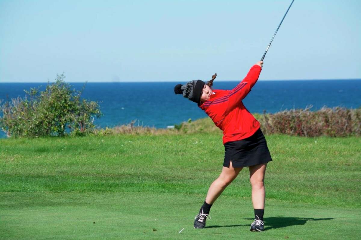 Gigi Green, of Big Rapids, tees off during a competition last season. (Pioneer file photo)