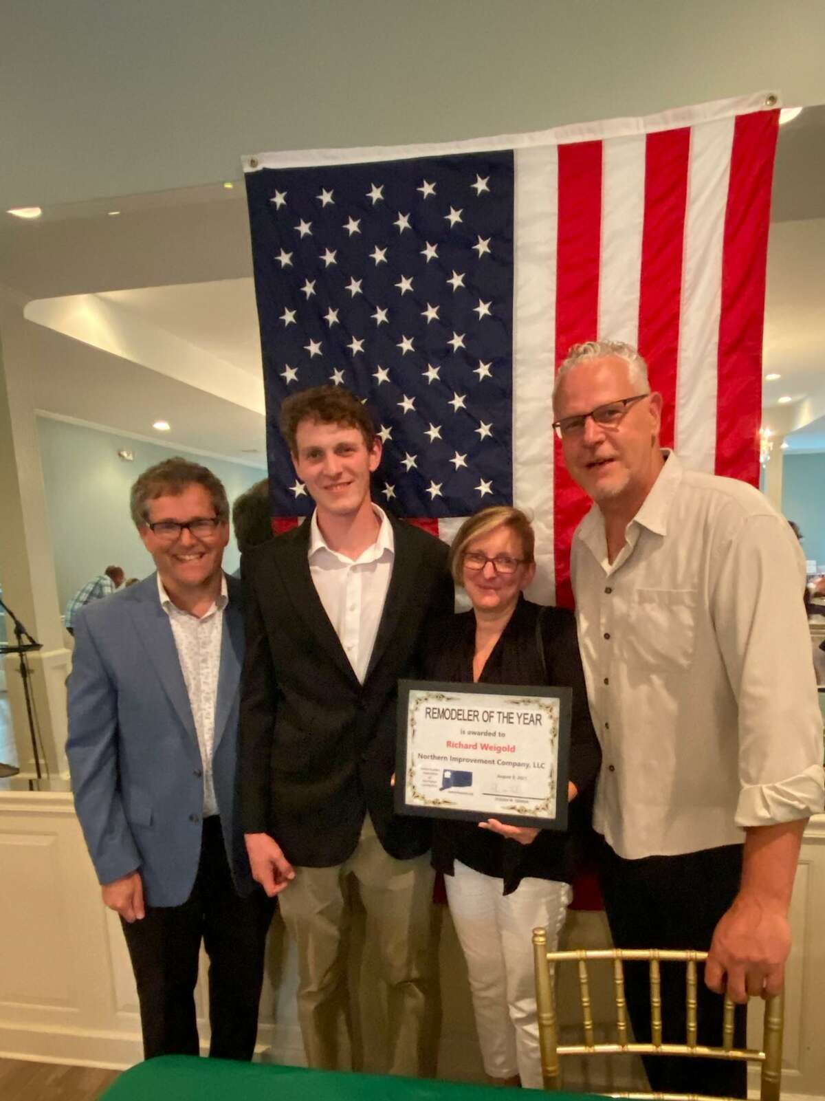 The Home Builder Association of Northwest CT joined the Litchfield County Chapter of the Greater Hartford Association of Realtors to honor Remodeler of the Year Northern Improvement Company of Torrington. From left are Steve Temkin and owners Mason, Cara and Richard Weigold.