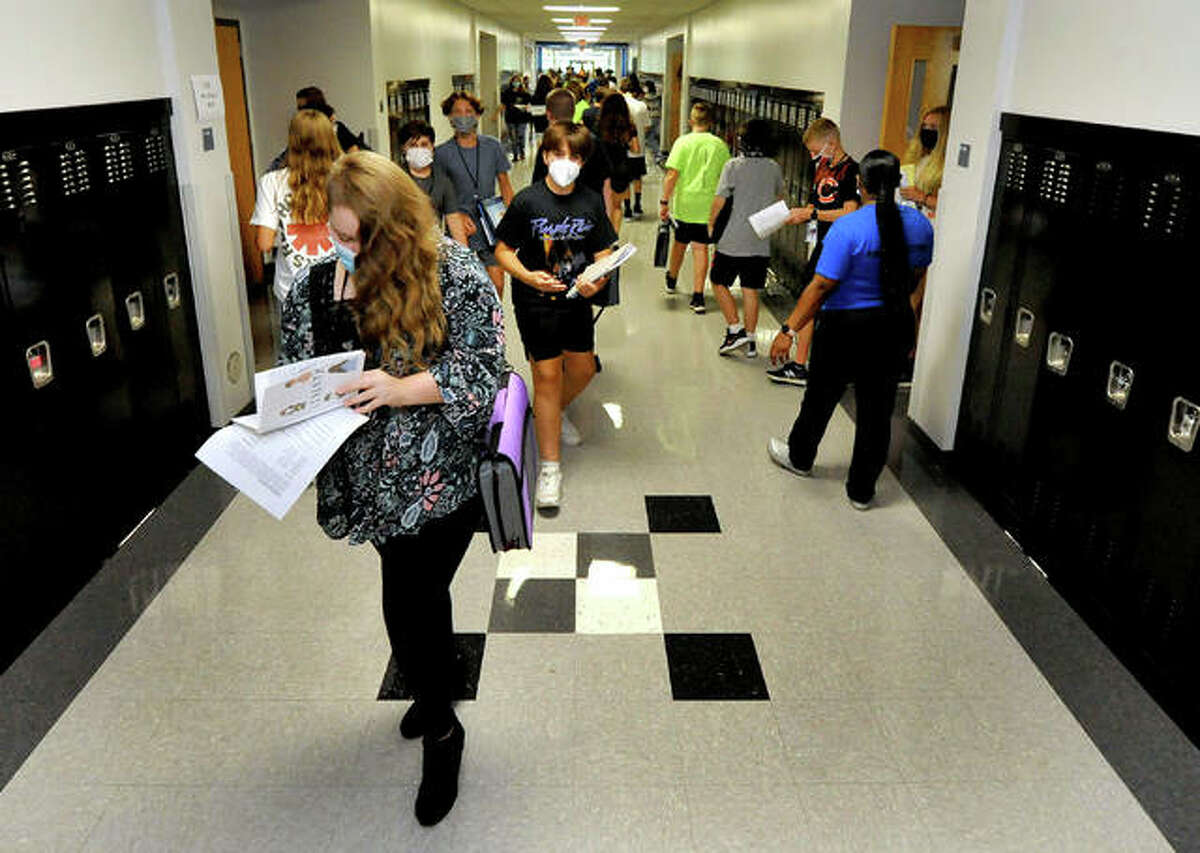 Students walk down the hallway at Libery Middle School on the first day of school last semester. 