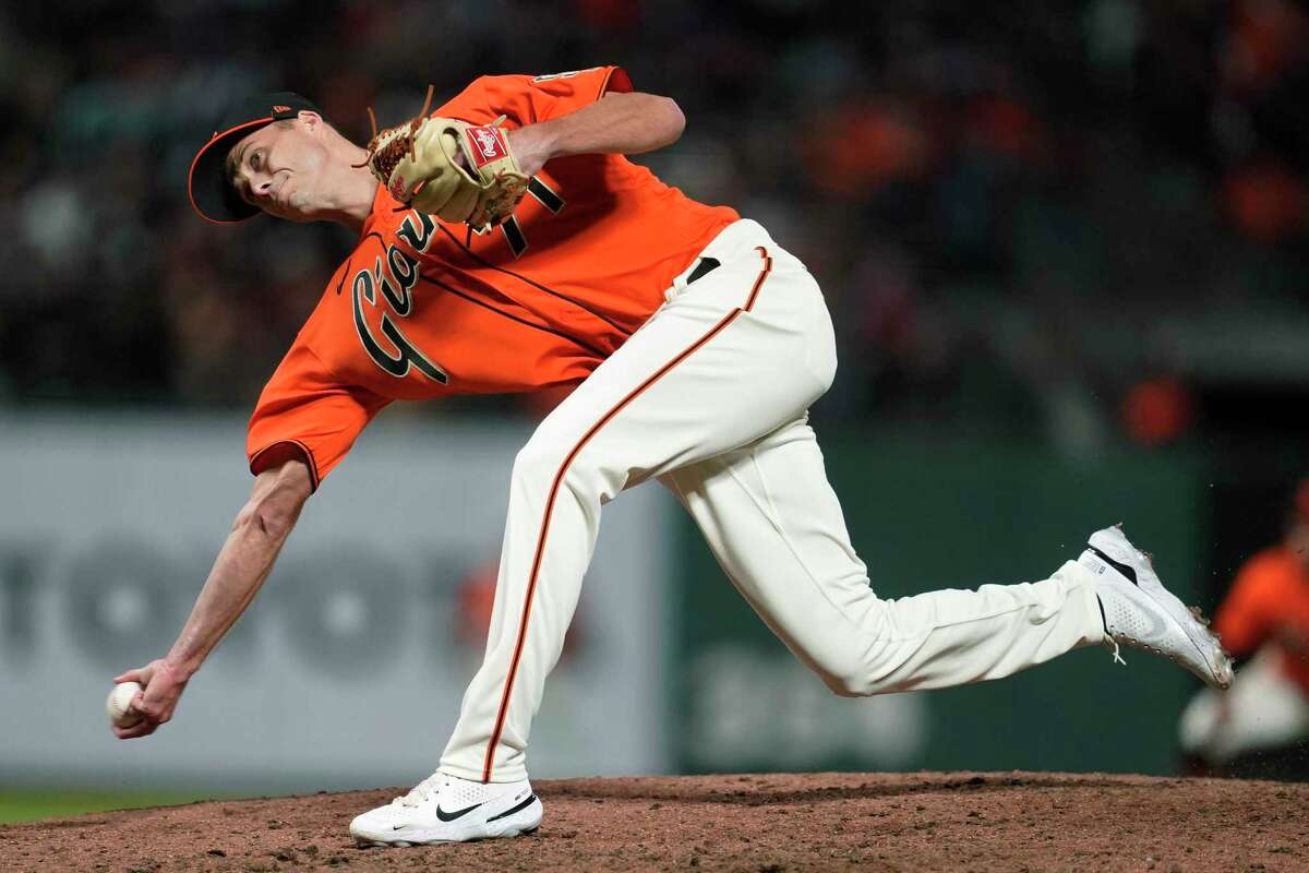 San Francisco Giants' Tyler Rogers pitches against the Colorado Rockies during the eighth inning of a baseball game in San Francisco, Friday, Aug. 13, 2021. (AP Photo/Jeff Chiu)