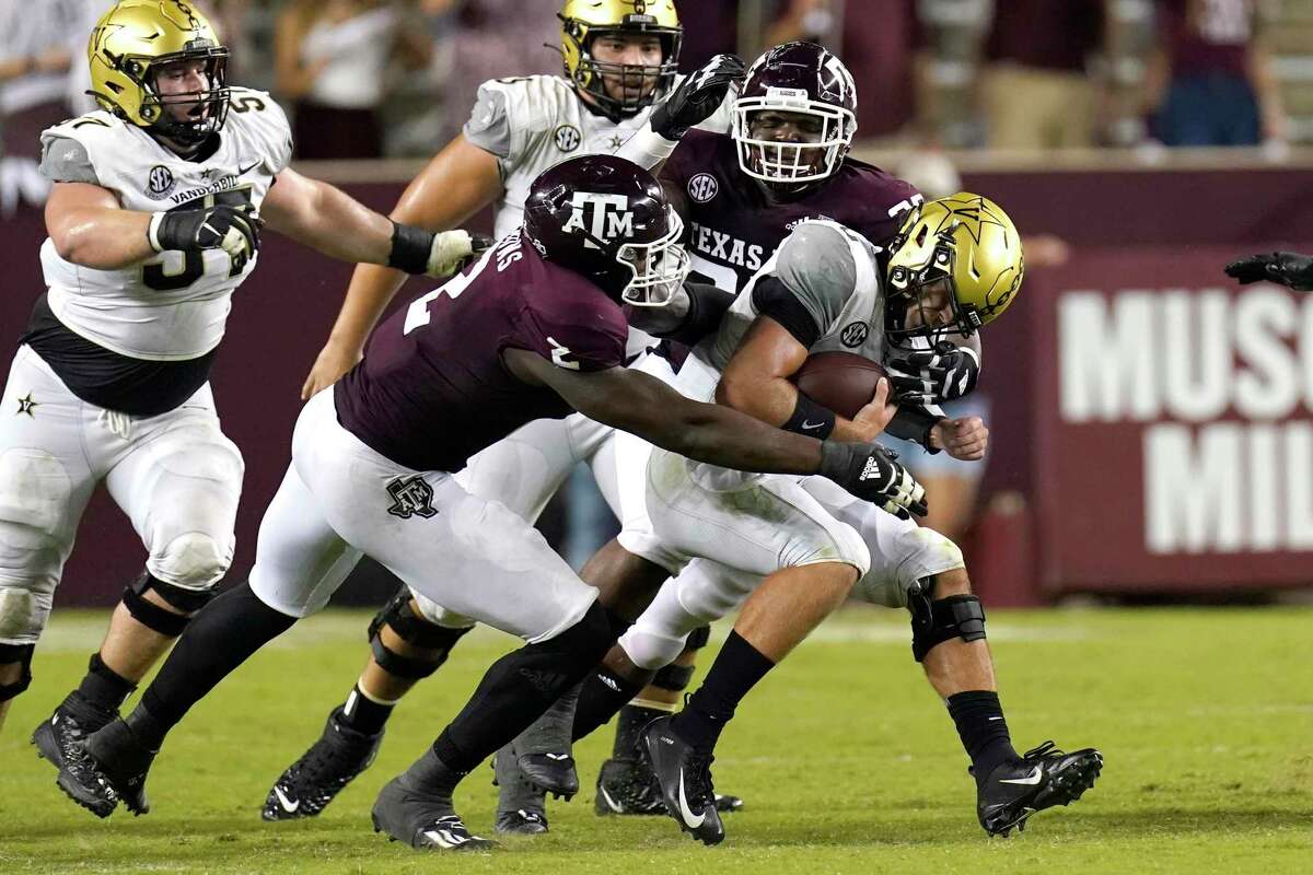 Texas A&M’s Micheal Clemons (2) McKinnley Jackson during the second half of an NCAA college football game Saturday, Sept. 26, 2020, in College Station, Texas. Texas A&M won 17-12. (AP
