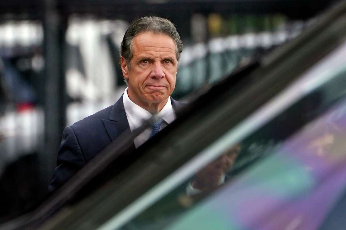 Gov. Andrew Cuomo prepares to board a helicopter after announcing his resignation, Tuesday, Aug. 10. (AP Photo/Seth Wenig)