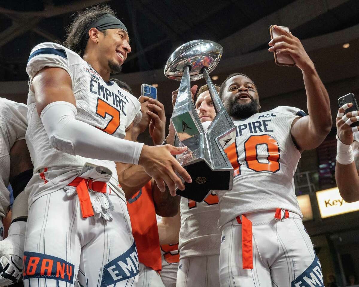 Albany Empire receiver Malachi Jones (7) and Varmah Sonie celebrate after winning the National Arena League championship game against the Columbus Lions in their first season in the league. The team's schedule for the second season is out now.