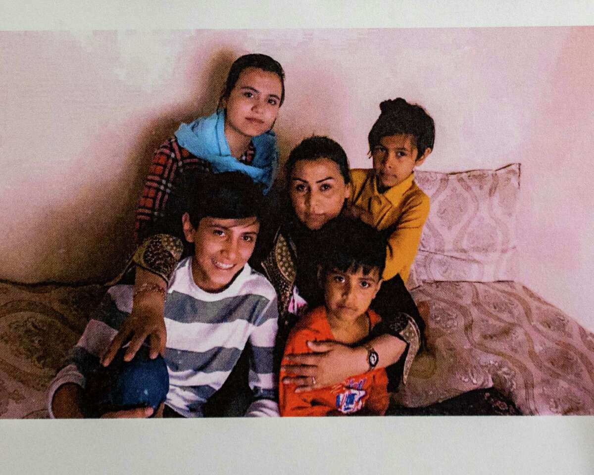 A photo of Suneeta and her four children. She talked to the media at the U.S. Committee for Refugees and Immigrants in Albany, NY, on Sunday, Aug. 15, 2021 about efforts to get them out of Afghanistan (Jim Franco/Special to the Times Union)