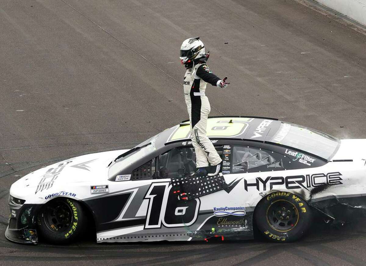 AJ Allmendinger celebrates after winning NASCAR’s Verizon 200 at the Brickyard at Indianapolis Motor Speedway.