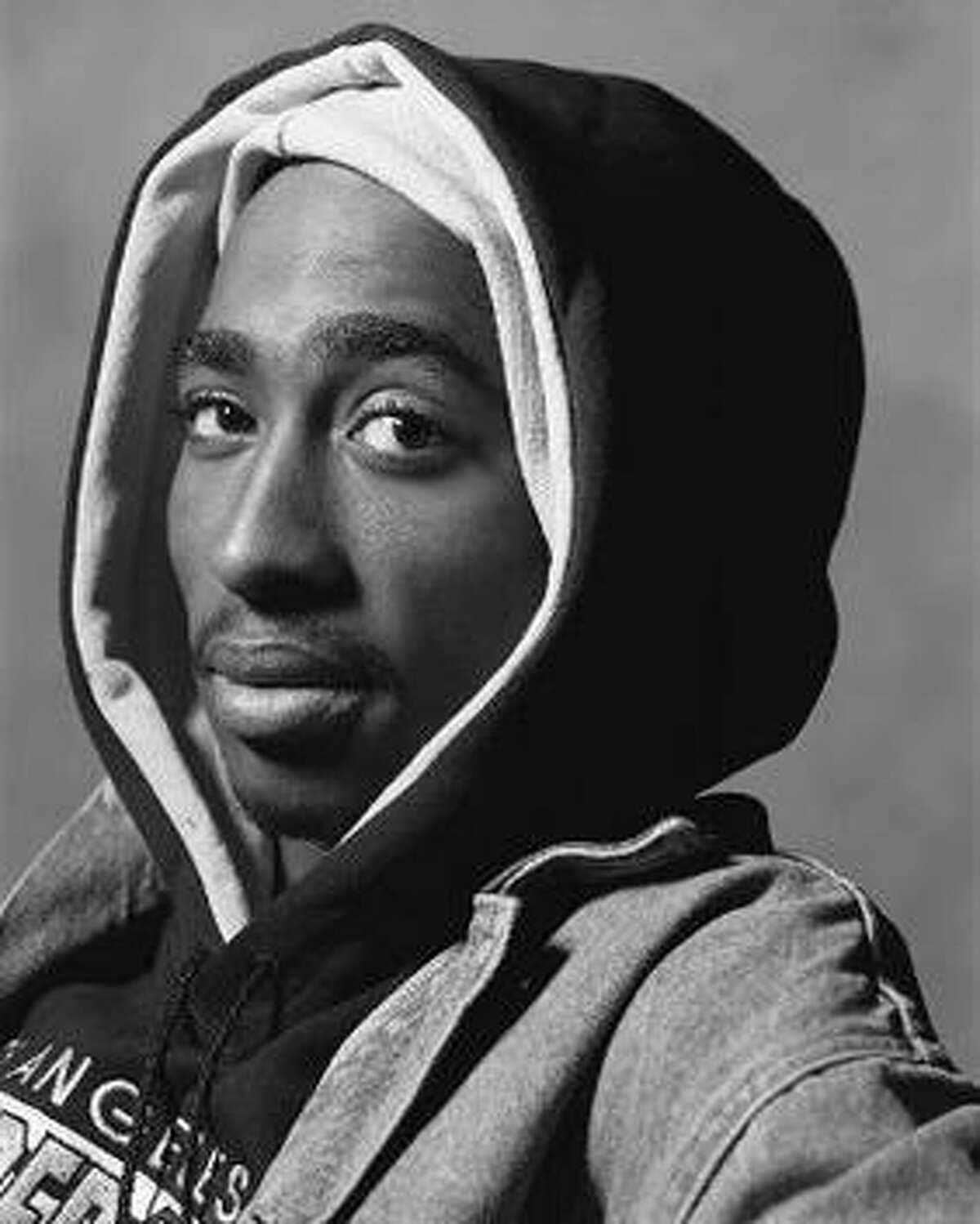 Tupac Shakur, Elvis, More Dead Celebs Rumored to Be Alive (PHOTOS)