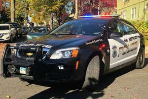 Hartford police: Slain man slain was found shot in a crashed car