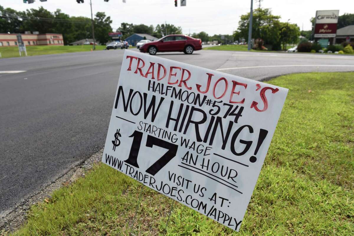 Help wanted signs for the new Trader Joe's supermarket are posted along Route 9 on Monday, Aug. 16, 2021, at Halfmoon Crossing in Halfmoon, N.Y.