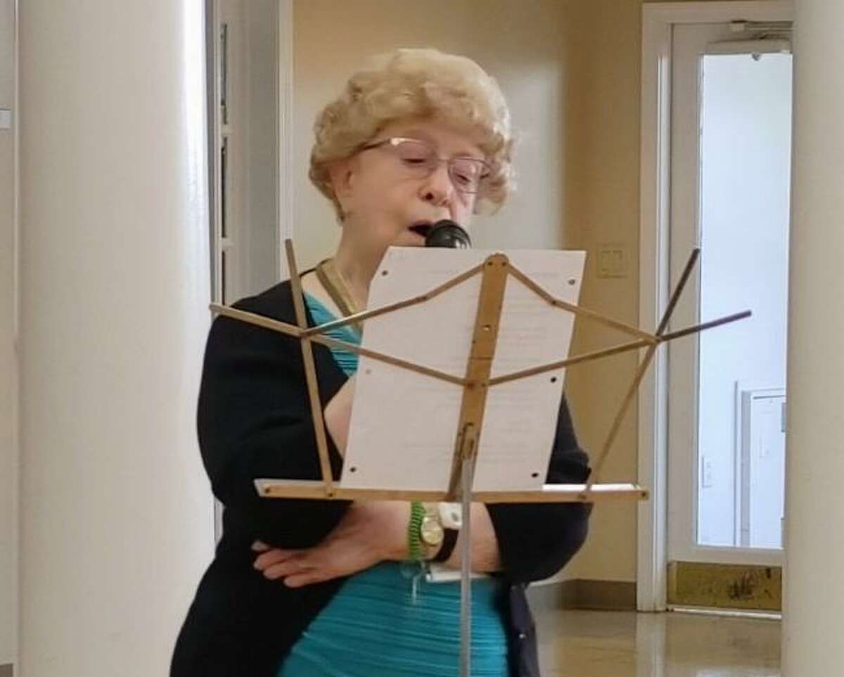 Jean Michalak singing a solo at the Shelton Songsters' concert at the Shelton Senior Center on July 23, 2021. She just turned 91.