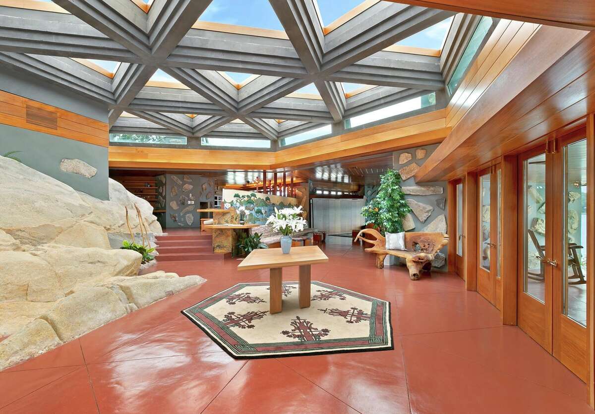 Visitors will be greeted by geometric skylights and exposed rock in the entry hall.