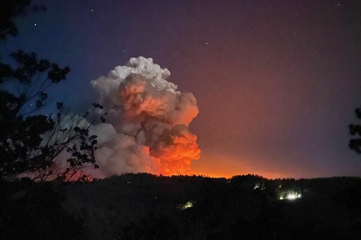 Guy Tucker photographed the Caldor fire three miles west of Fair Play, Calif., Late on Monday night, August 16, 2021.