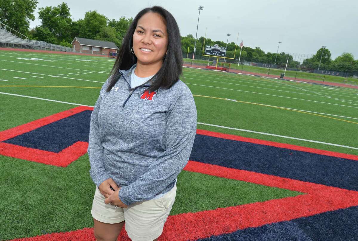 Ashley Labrador, an Atheletic Director at Brien McMahon High School stands on Jack Cassagrande Field on Thursday May 31, 2018 in Norwalk Conn. where she performed CPR and saved the life of a spectator at an event.
