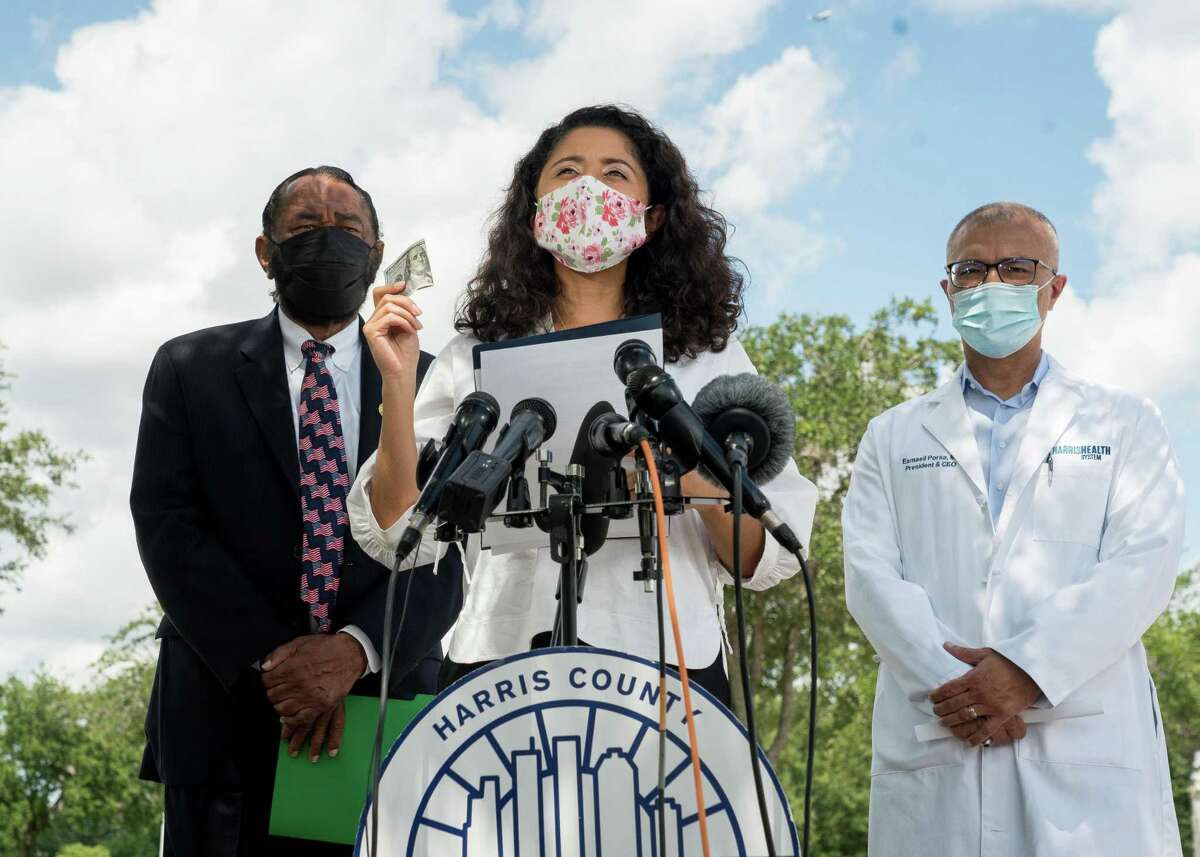 Harris County judge Lina Hidalgo announced that each person getting their first COVID-19 vaccine will receive $100, during a press conference at NRG Park on Tuesday, Aug. 17, 2021, in Houston. The new public health initiative is an attempt to address the ongoing COVID-19 emergency.