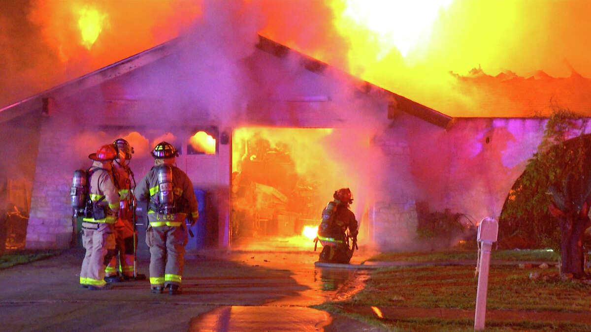 It took firefighters over an hour to knock down a fire in the 12400 block of La Lira Street that hospitalized one woman and killed one dog, San Antonio fire officials said.