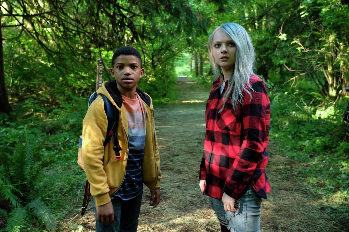 Gunner (Lonnie Chavis) and his friend Jo (Amiah Miller) head out into the woods in “The Water Man.”