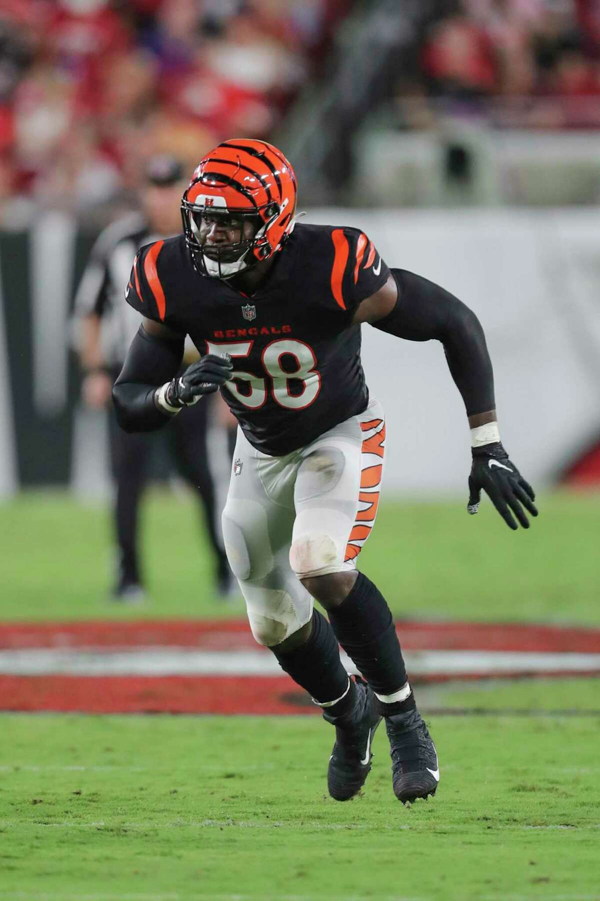 Cincinnati Bengals defensive end Joseph Ossai (58) lines up for