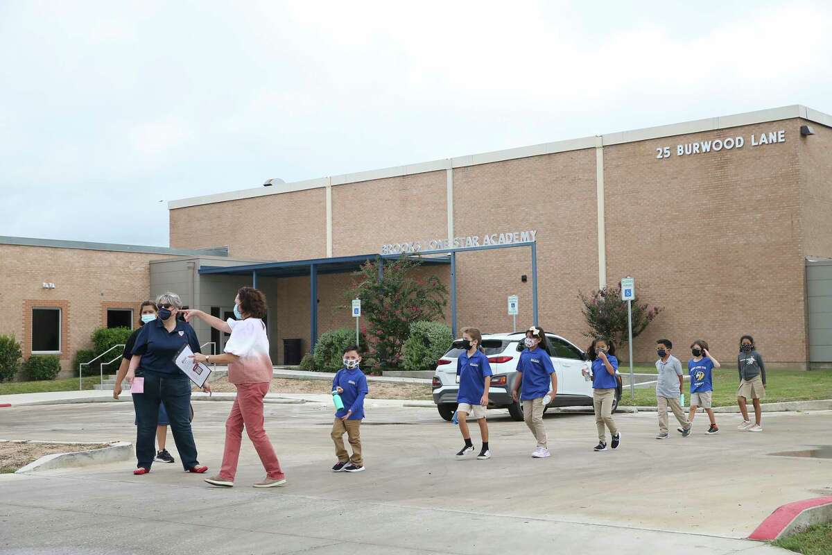 A man crashed into a North Side elementary school after stabbing