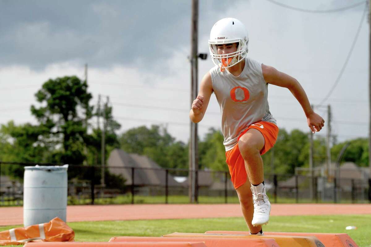 Orangefield gets in evening practice as they prep for the start of the 2021 football season. Photo made Tuesday, August 3, 2021 Kim Brent/The Enterprise