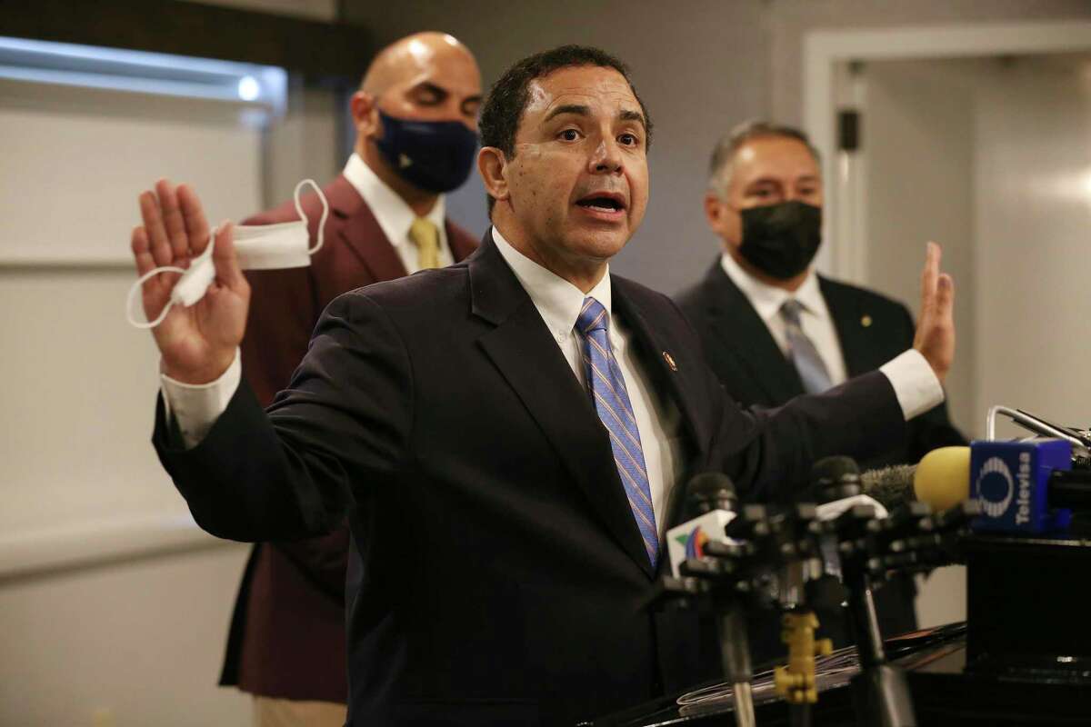 U.S. Rep. Henry Cuellar addresses the media after meeting with U.S. Homeland Security Secretary Alejandro Mayorkas in McAllen, Texas, Thursday, Aug. 12, 2021. Saenz and other officials present are asking the Biden Administration to stop the record flow of migrants crossing into the U.S.