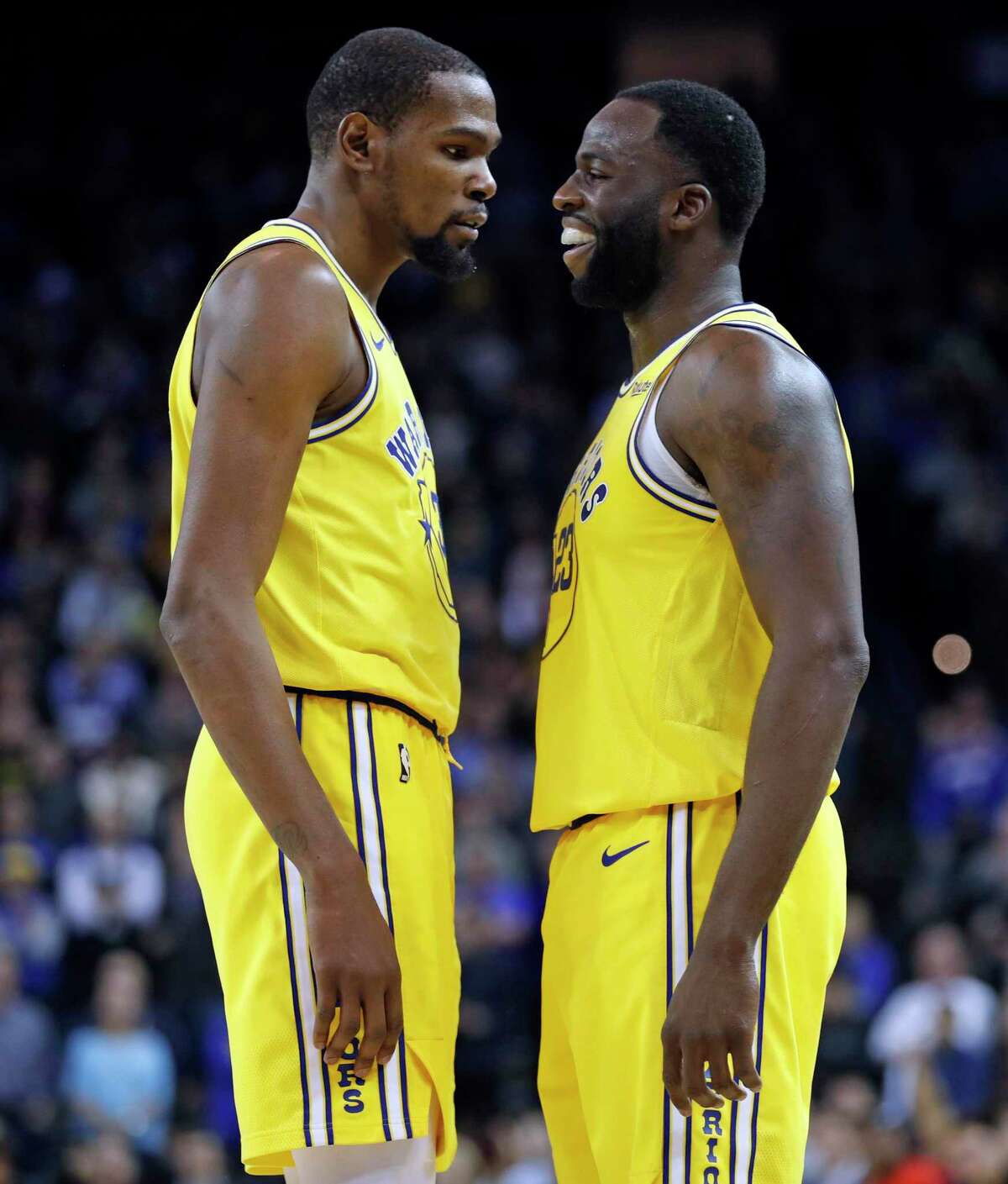 Golden State Warriors' Kevin Durant reacts to a Draymond Green technical foul in 4th quarter of Warriors' 125-123 win over Sacramento Kings in NBA game at Oracle Arena in Oakland, Calif., on Thursday, February 21, 2019.