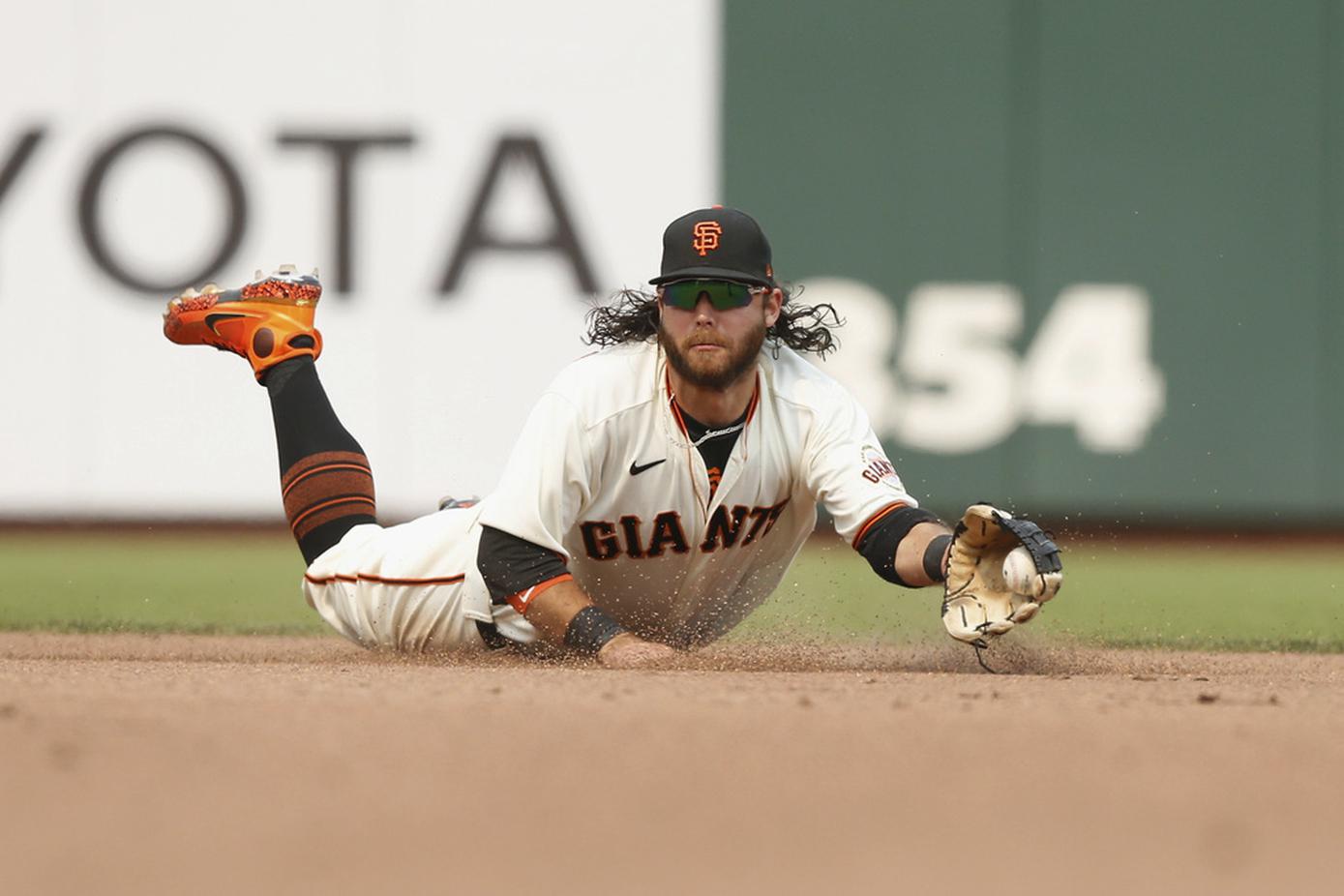 J.D. Davis and LaMonte Wade Jr. #31 of the San Francisco Giants News  Photo - Getty Images
