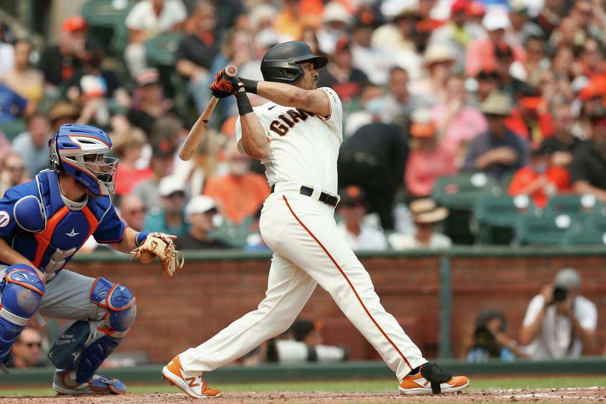 LaMonte Wade Jr. #31 of the San Francisco Giants warms up before