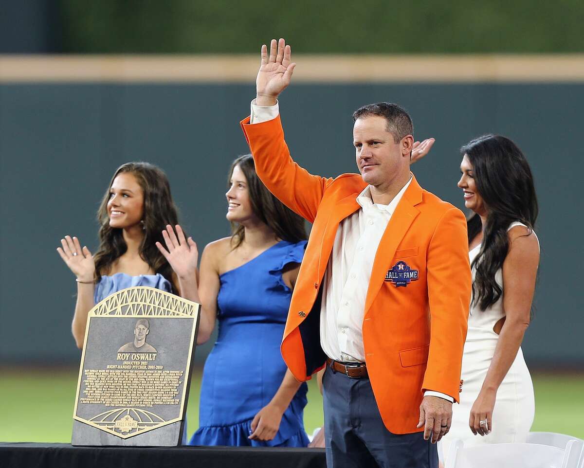 Former Houston Astros pitcher Roy Oswalt is joined by his wife and daughters as he is inducted into the Astros Hall of Fame before playing the Minnesota Twin at Minute Maid Park on August 07, 2021 in Houston, Texas. (Photo by Bob Levey/Getty Images)