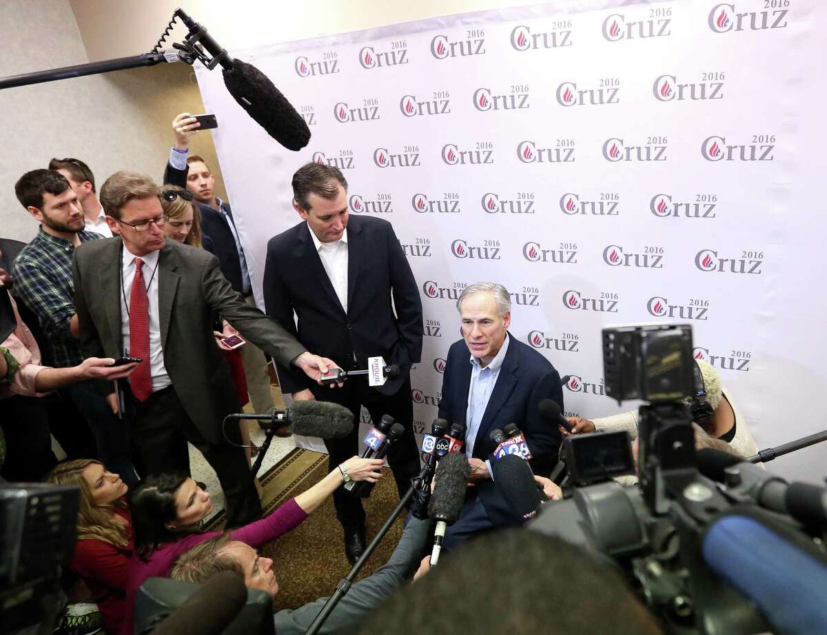 Texas Gov. Greg Abbott, center right, speaks with Sen. Ted Cruz, R-Texas, during a press conference after a rally at Mach Industrial Group Wednesday, Feb. 24, 2016, in Houston. Cruz came in third place in the recent Nevada Caucus, and spoke about the upcoming "Super Tuesday" contests. ( Jon Shapley / Houston Chronicle )