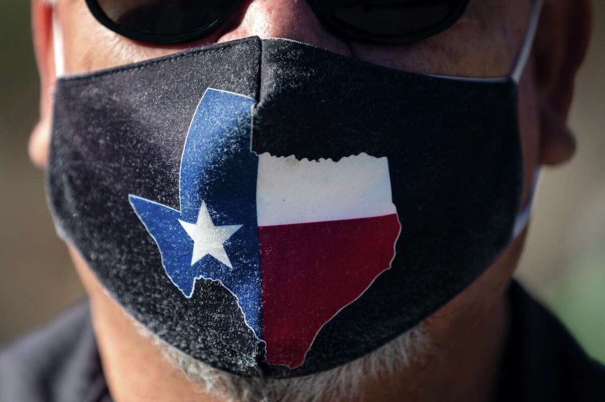 AUSTIN, TX - MARCH 03: San Jose Hotel engineering manager Rocky Ontiveros, 60, wears a Texas mask on March 3, 2021 in Austin, Texas. Gov. Greg Abbott announced a new executive order that will end the statewide mask mandate and allow businesses to reopen at 100% capacity on March 10, 2021.(Photo by Montinique Monroe/Getty Images) *** BESTPIX ***
