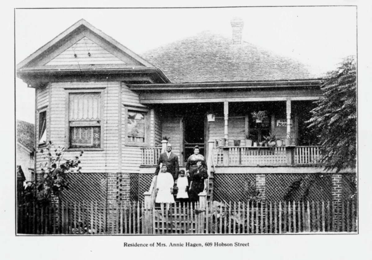 Annie Hagen, shown with family members on the steps of her circa 1908 home at 609 Hobson St., was a much-respected nurse and midwife.